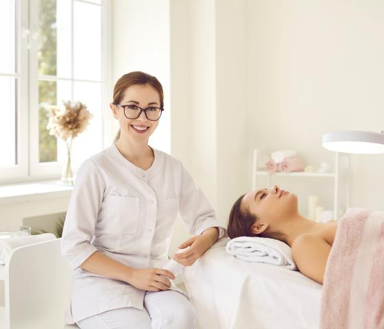 Decorative Image - Portrait of happy dermatologist, skin therapist, beautician and skincare professional in workplace.