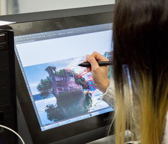 Decorative image - close up of a person working on a digital animation artwork