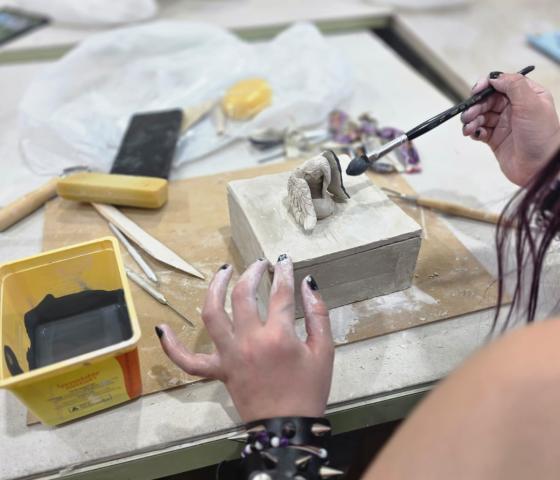 Decorative image - Student making a clay model - NMTAFE