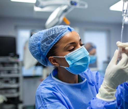 Trained Anaesthetic Technician working in hospital theatre room