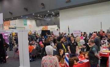 Lots of people visiting NMTAEF's Try-a-skill area at the SkillsWestExpo